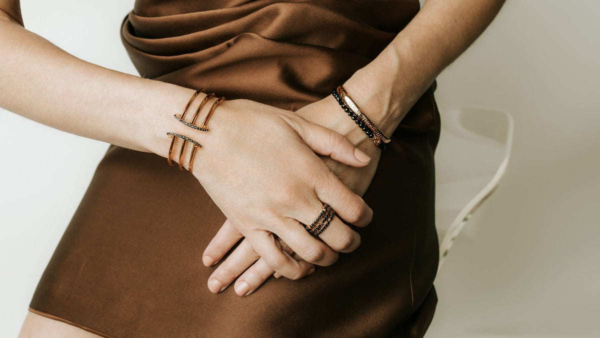 Rose Gold and CZ noir REALM jewelry styled for fall