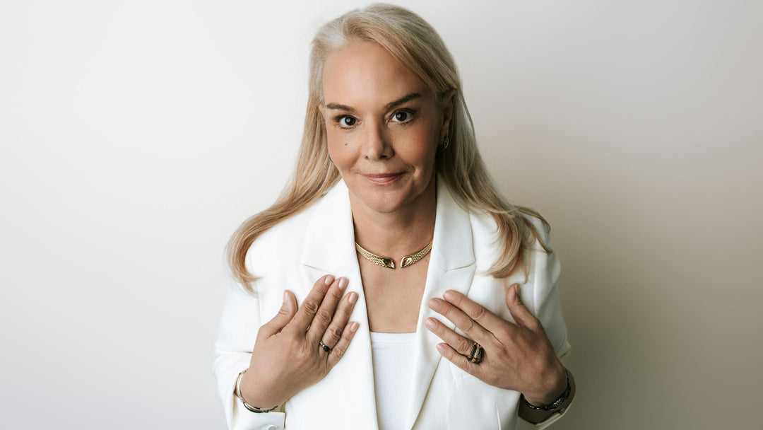 Jillian Dunn in white blazer wearing REALM gold jewelry — Real Woman of REALM.