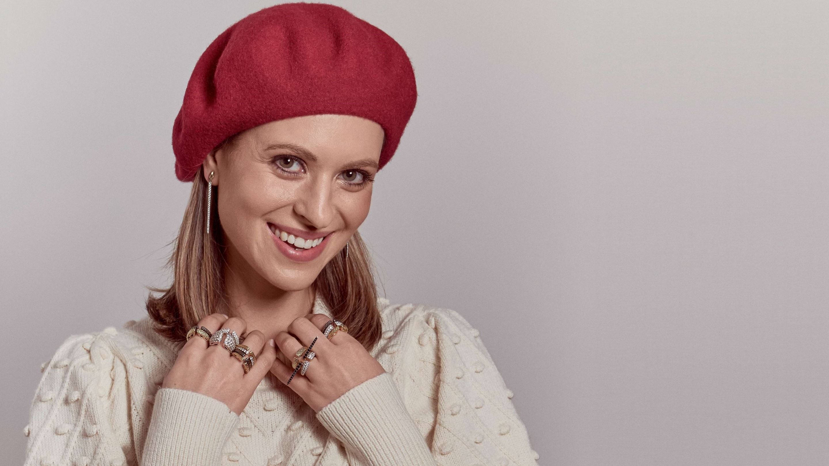 Victoria accessorizes her cozy sweater with glamorous sparkling earrings and corset cuff in 18K Gold Vermeil + CZ Blanc. As seen on The Drew Barrymore Show.