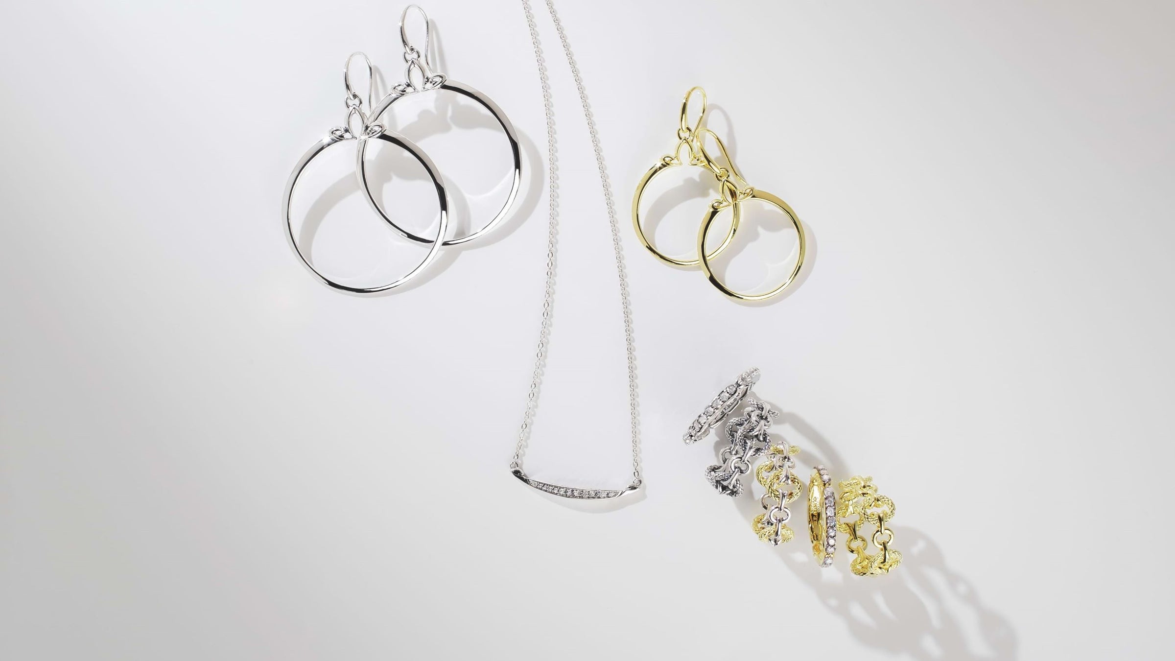 Array of silver and gold jewelry from REALM under $250