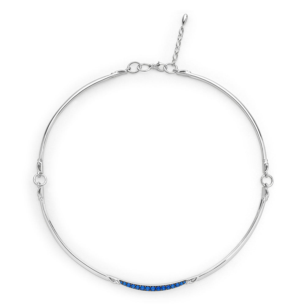 silver necklace with blue gemstone 