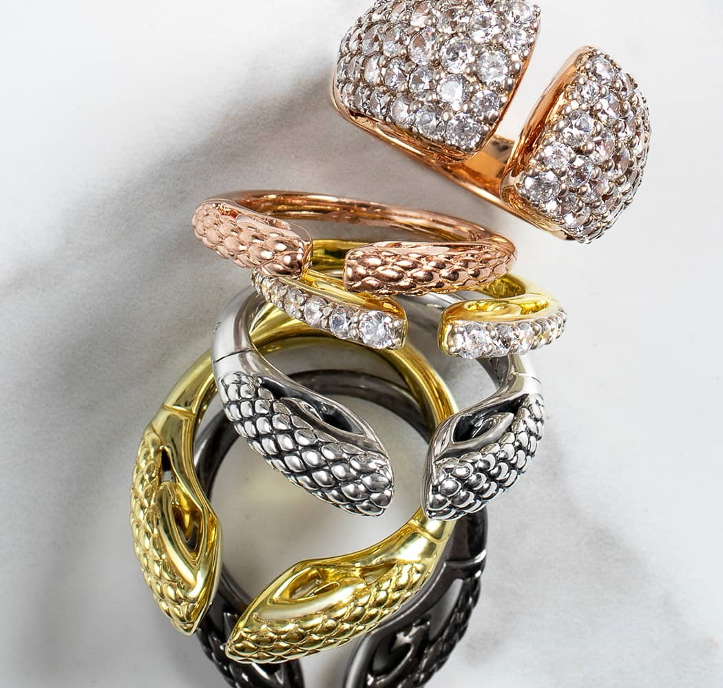 Luxurious array of stack rings from REALM Fine + Fashion Jewelry