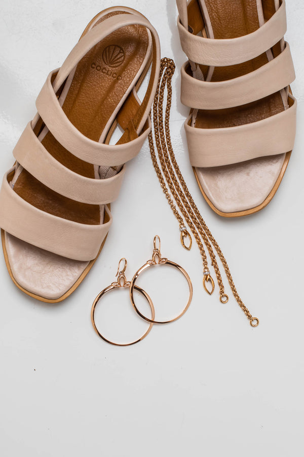 A perfect summer pairing: REALM 18K Rose Gold Vermeil jewelry and rose sandals from Bus Stop Boutique